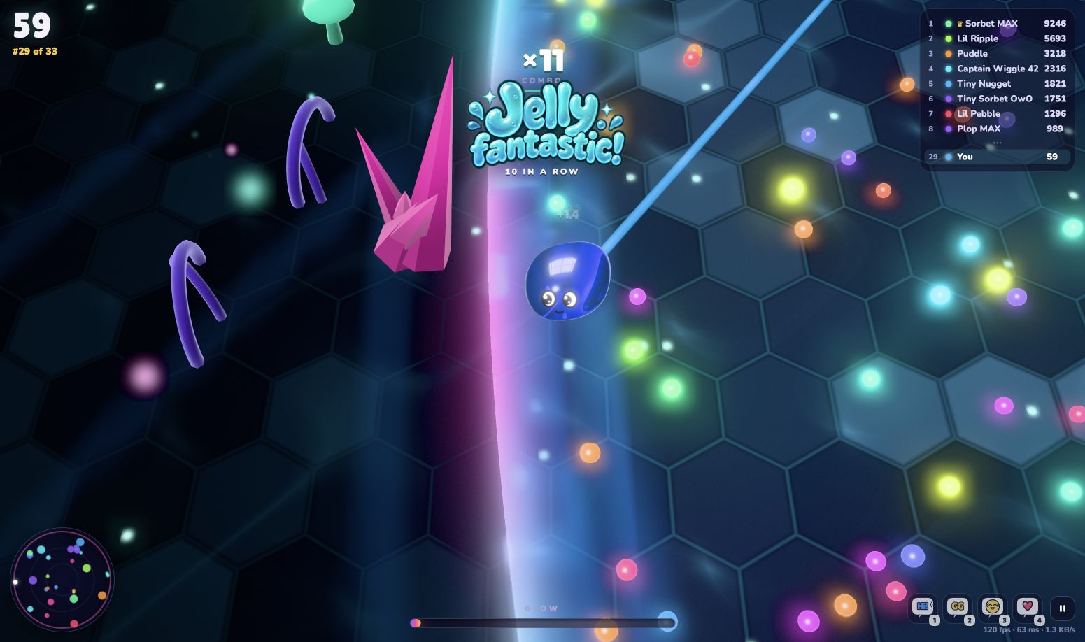 JellyBlob gameplay captured during our browser play check. A blue jelly leaves a thin glowing trail beside the pond boundary, with colorful dew scattered over hexagonal tiles and a combo counter above it. Game by Måns Gullberg / kvickan; screenshot by Attract Mode.